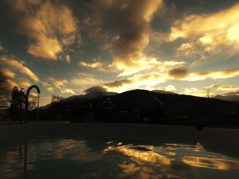 Qc Terme Grand Hotel Bagni Nuovi Бормио Екстериор снимка Sunset over the lake